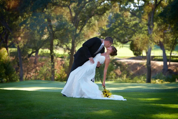 newlyweds celebrating their marriage at the reception